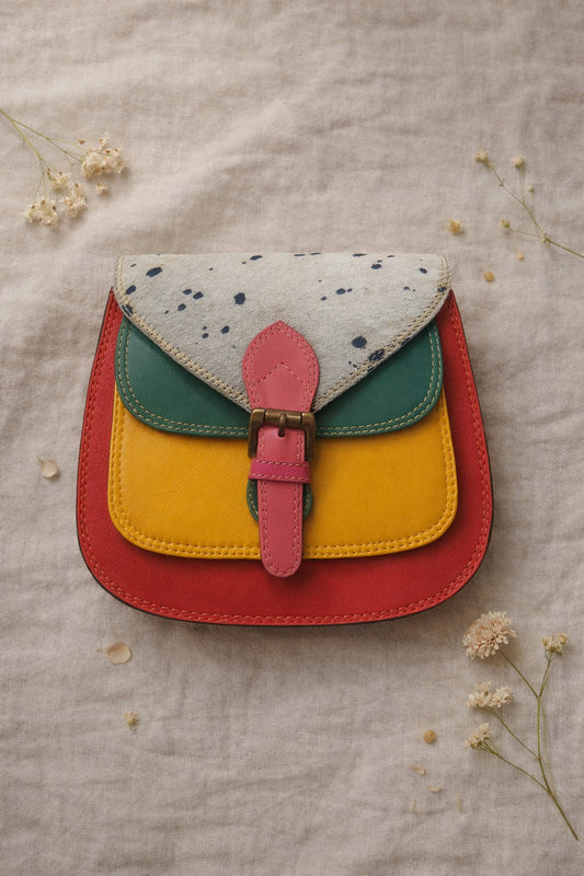 Handmade Leather Crossbody Bag featuring a colorful design in yellow, red, green, and blue shades, ideal for stylish everyday use.
