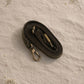Handmade Leather Crossbody Bag - Romy with colorful panels and animal print flap on a light background.