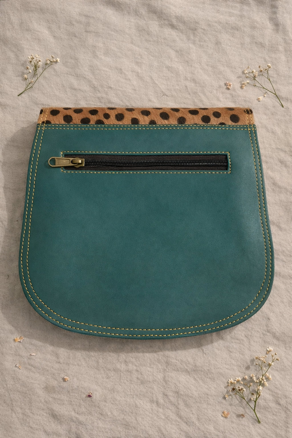 Handmade Leather Crossbody Bag with vibrant colors and polka dot pattern, perfect for everyday style.