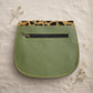 Handmade Leather Crossbody Bag featuring vibrant colors and leopard print flap, perfect for stylish outings.
