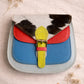 Handmade Leather Crossbody Bag featuring vibrant colors and unique textures, perfect for summer style.