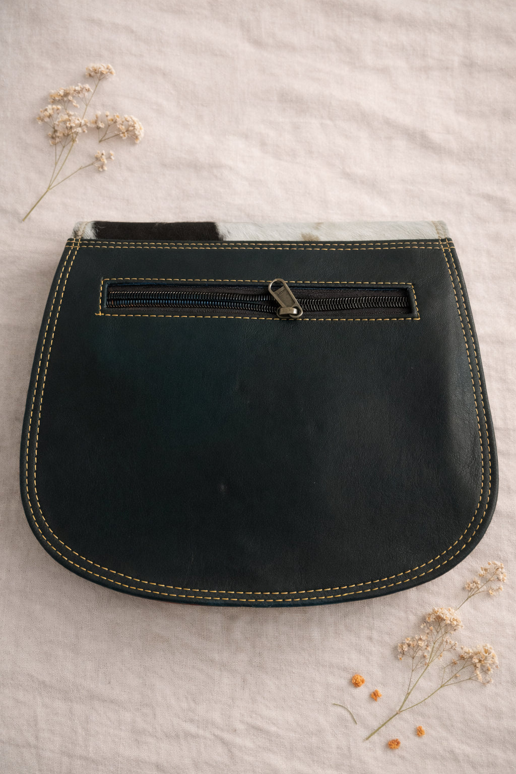 Handmade Leather Crossbody Bag featuring vibrant colors and unique textures, perfect for summer style.