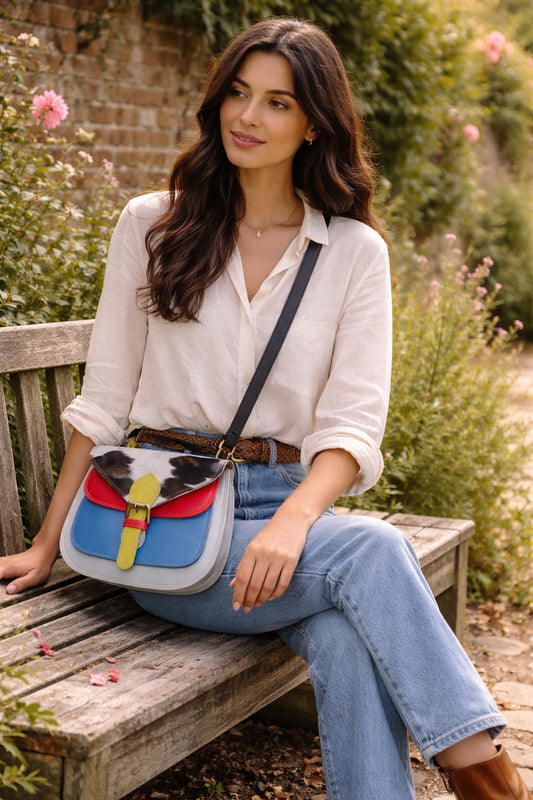 Handmade Leather Crossbody Bag featuring vibrant colors and unique textures, perfect for summer style.