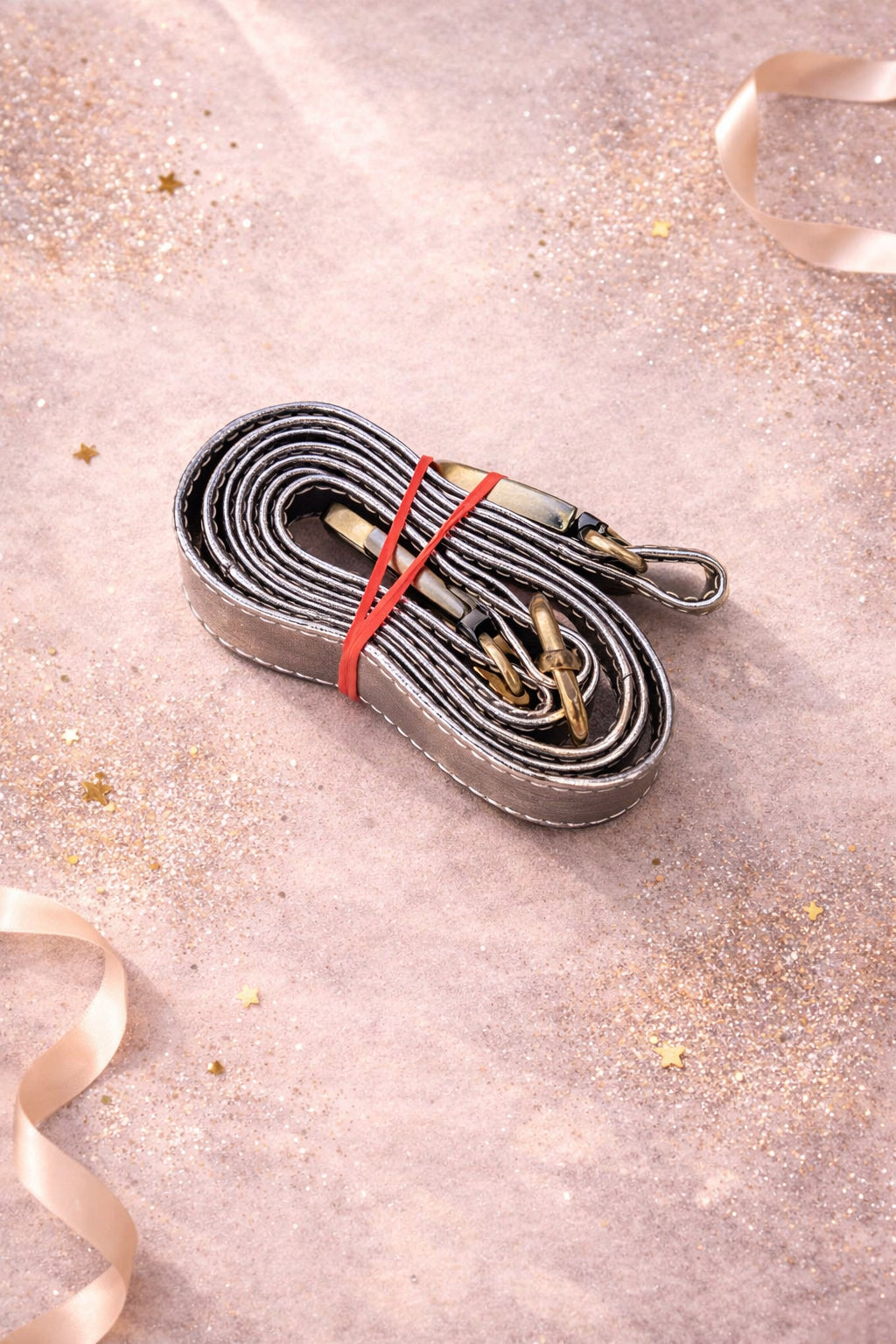 Handmade Leather Crossbody Bag - Romy - Luna in metallic finish with buckle detail on a soft background.