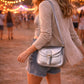 Handmade Leather Crossbody Bag - Romy - Luna in metallic finish with buckle detail on a soft background.