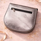 Handmade Leather Crossbody Bag - Romy - Luna in metallic finish with buckle detail on a soft background.