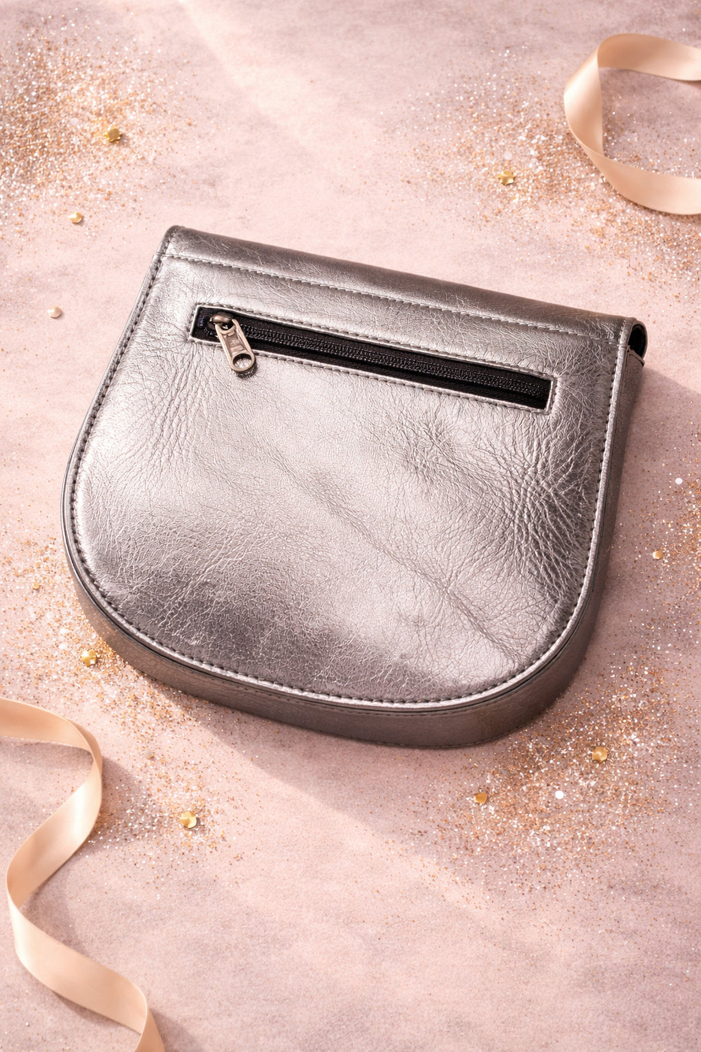 Handmade Leather Crossbody Bag - Romy - Luna in metallic finish with buckle detail on a soft background.