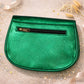 Handmade Leather Crossbody Bag in vibrant green worn at a festival, giving a stylish and fun vibe.