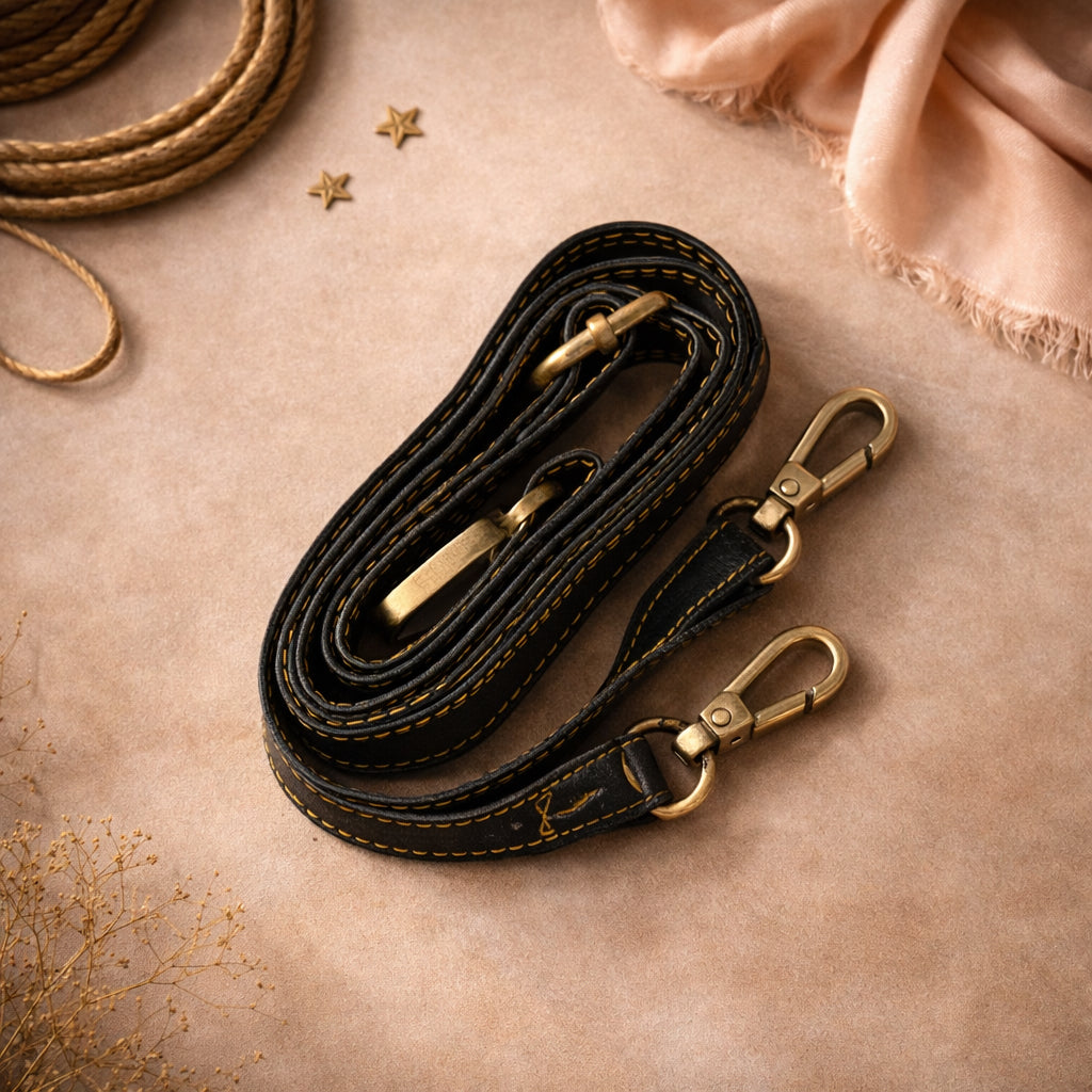 Handmade Leather Crossbody Bag - Romy featuring multiple colors and a stylish buckle strap on a textured background.