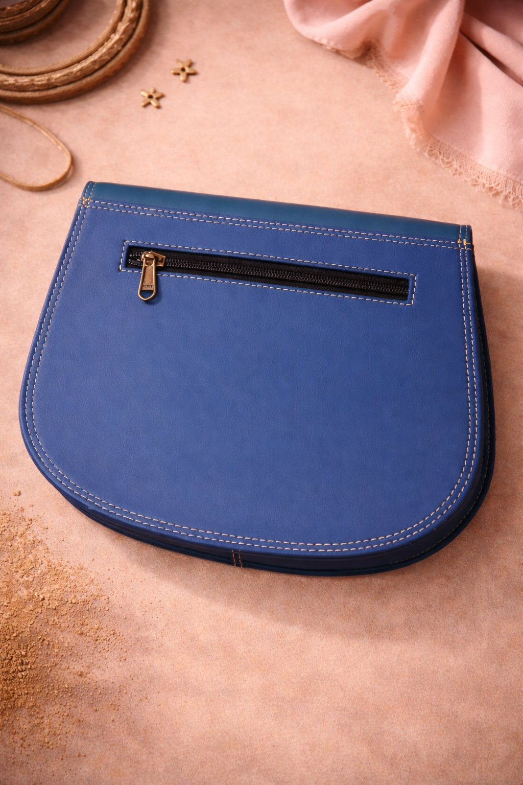 Handmade Leather Crossbody Bag - Romy - High Plains Painted Sky on a stylish background with a strap.