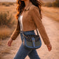 Handmade Leather Crossbody Bag - Romy in High Plains Sage Sky with polka dot flap and adjustable strap.
